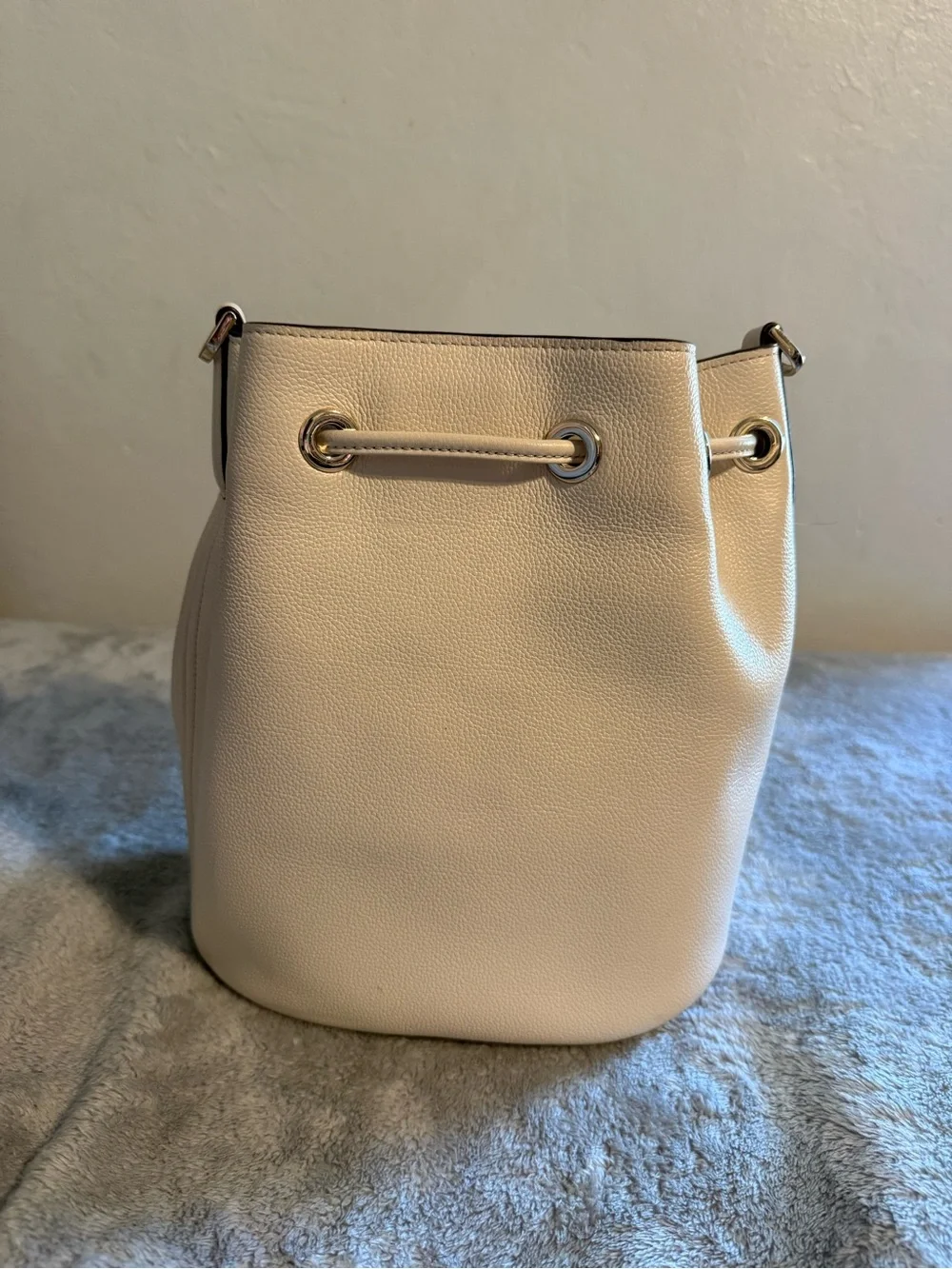 kate spade Cream Pebble Leather Drawstring Bucket Bag with Striped Strap